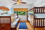 Bedroom 2 features twin bunk beds and another twin bed with a slide out trundle bed. Whisper-quiet AC and black-out blinds mean restful sleeps for the little ones. 